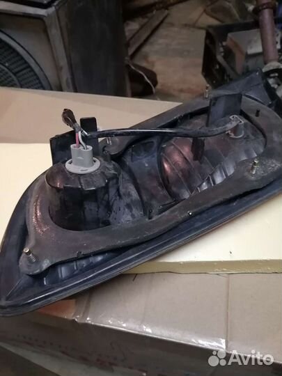 Фара Toyota Caldina левая задняя