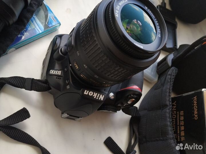 Зеркальный фотоаппарат nikon d3100 с 35mm, 50mm