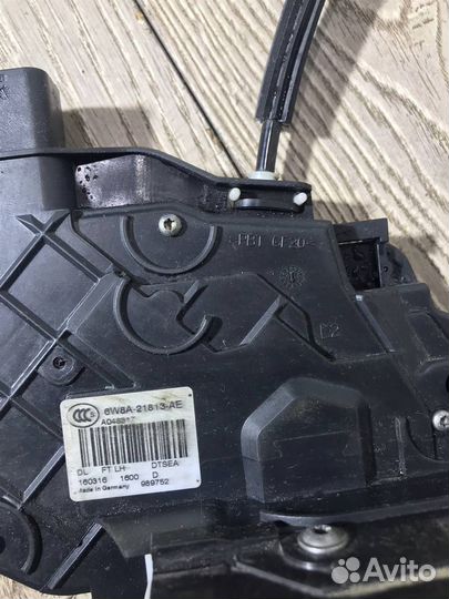 Замок двери передней левой Land Rover Discovery I