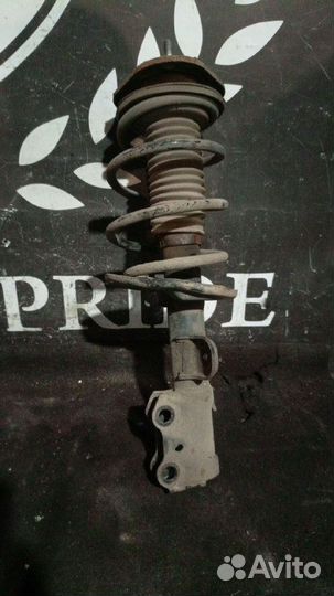 Передняя правая стойка Toyota Corolla 150