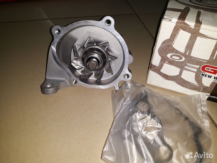 Помпа Mazda 3 5 6 323 626 RF2A15100C