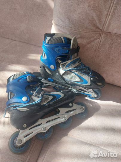 Роликовые коньки