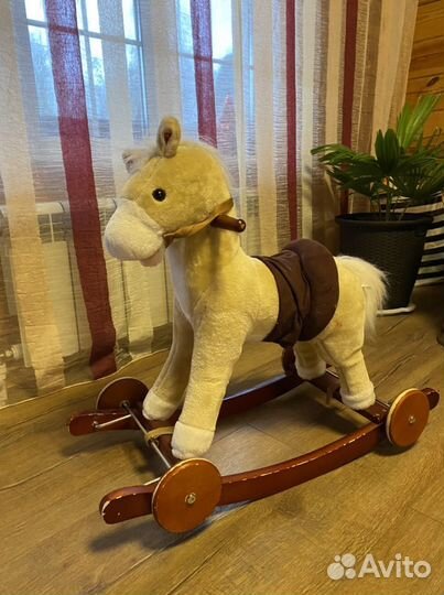 Лошадка качалка музыкальная