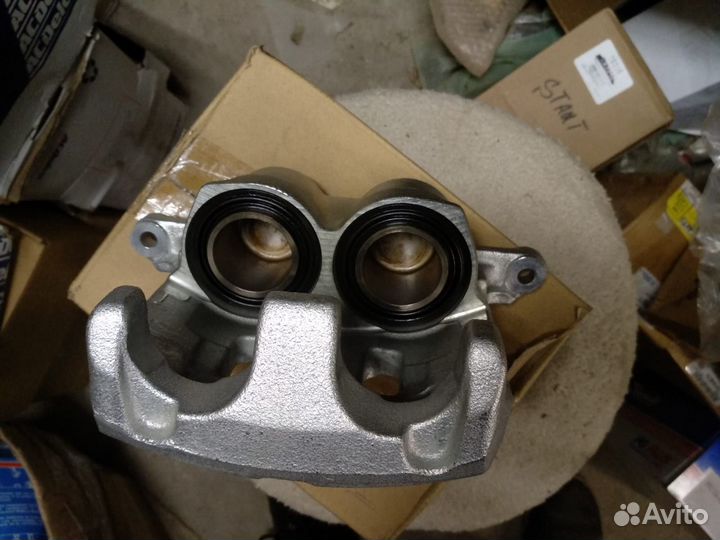 Тормозной суппорт перед, Шевроле Трелблезер с 2012