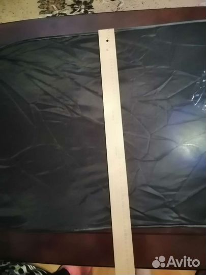 Солнцезащитная шторка на заднее стекло автомобиля