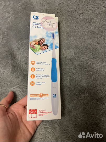 Электрическая зубная щетка