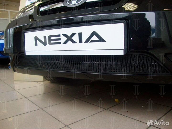 Защитная сетка радиатора черная Daewoo Nexia (2008
