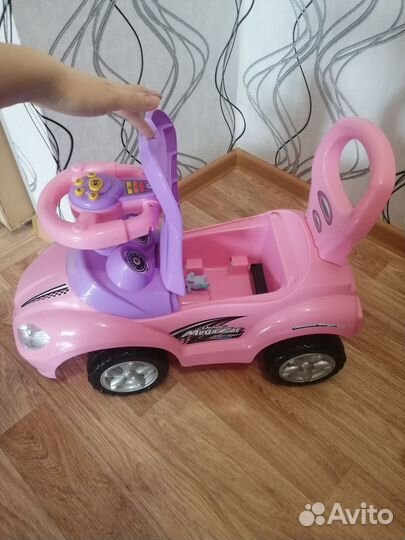 Машина каталка,музыкальная для девочки