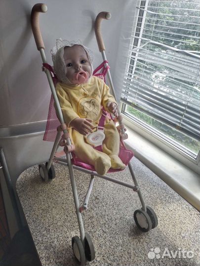 Кукла реборн в коляске