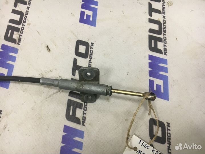 Трос кпп Мазда Демио