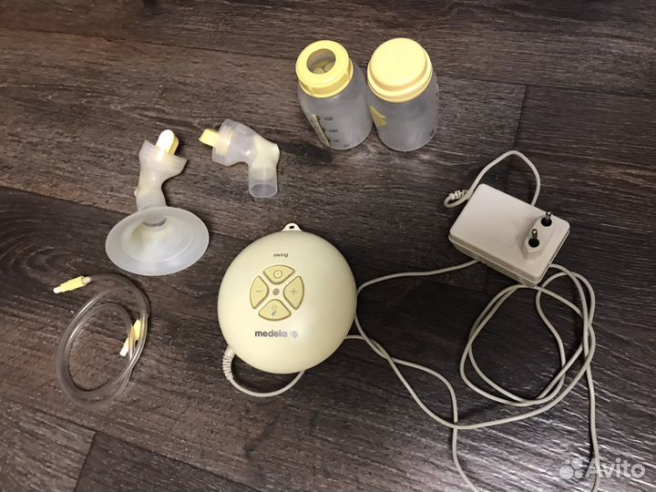 Молокоотсос medela электрический