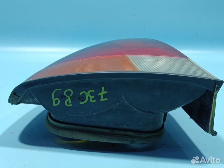 Фонарь левый наружный для Mitsubishi Carisma