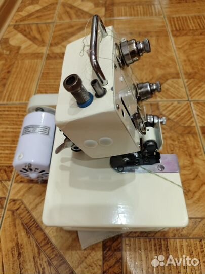 Краеобметочная машина