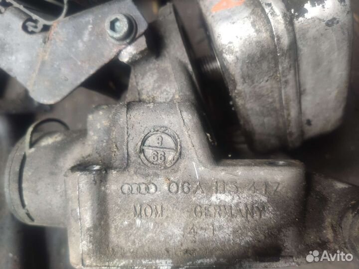 Кронштейн масляного фильтра 06A115405 VW Golf 4