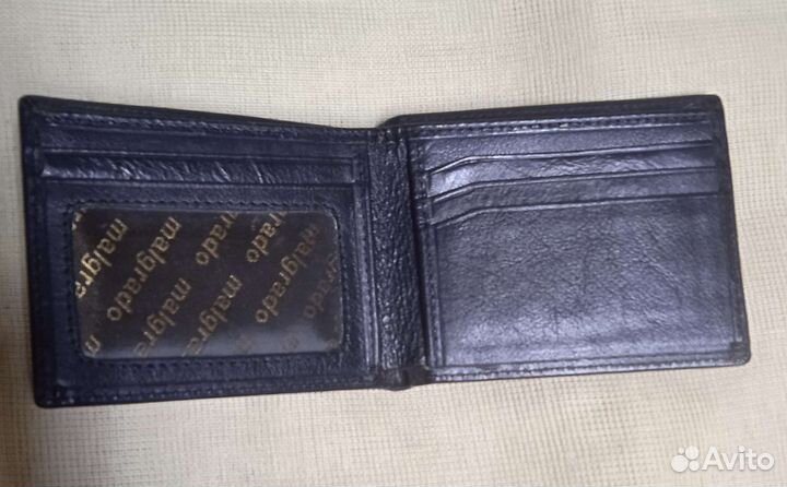 Кошелëк malgrado