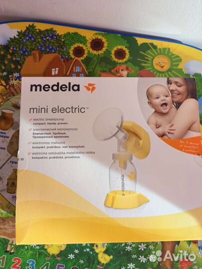 Молокоотсос medela электрический