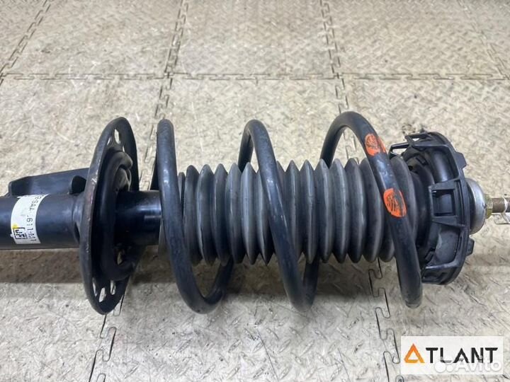 Стойка передняя левая honda FIT