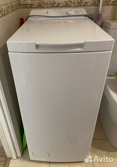 Стиральная машина с вертикальной загрузкой