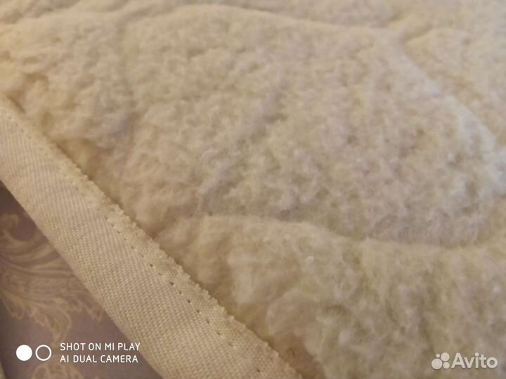 Наматрасник двусторонний 200 на 180 см