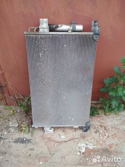 Радиатор кондиционера Мицубиси Лансер 10