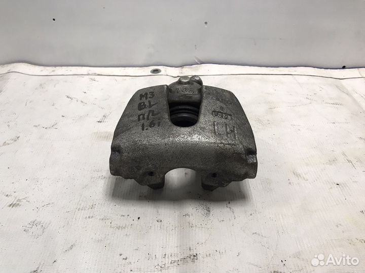 Суппорт передний левый Mazda 3 BL 1.6