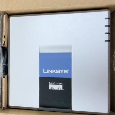 Голосовой шлюз VolP-телефонии Linksys SPA2102