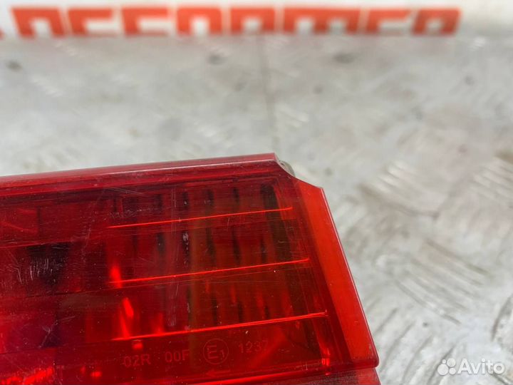 Фонарь задний противотуманный левый BMW 7-series e