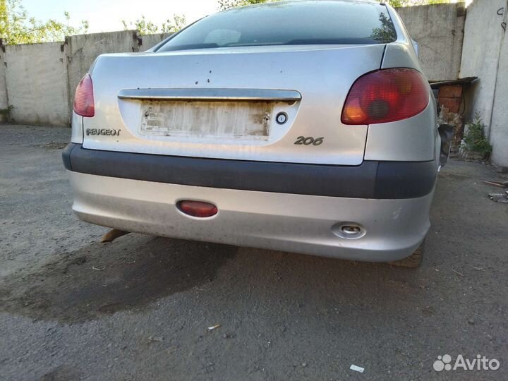 Задний бампер Peugeot 206 седан