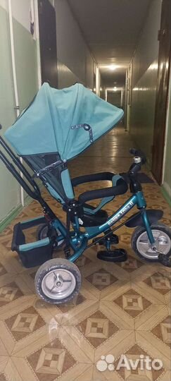 Детский трехколесный велосипед с ручкой