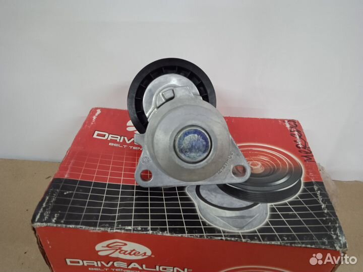 Натяжной ролик в сборе на Mazda-3 2002)