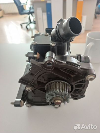 Термостат с помпой 06L121111H оригинал