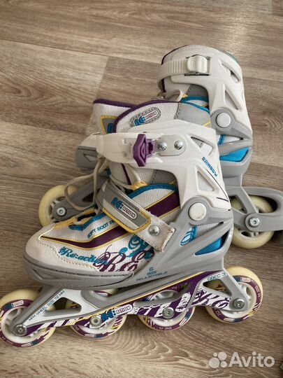 Роликовые коньки