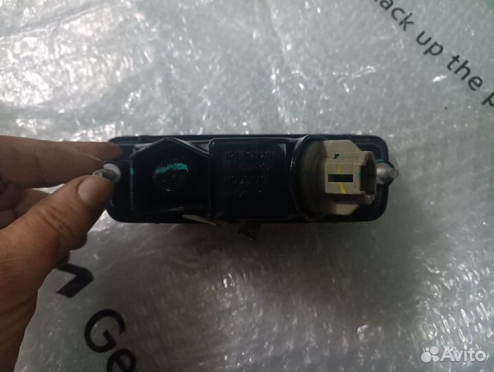 Фонарь противотуманный задний Nissan Tiida C11