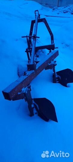 Плуг на трактор