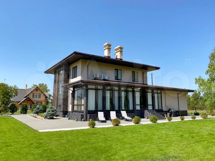 Коттедж 383,6 м² на участке 18,4 сот.