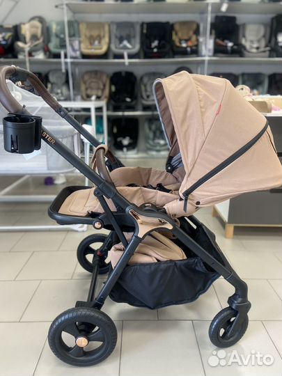 Коляска с реверсивным блоком