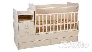 Детская кроватка с маятником