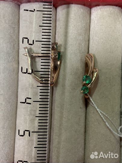 Золотые серьги с изумрудами