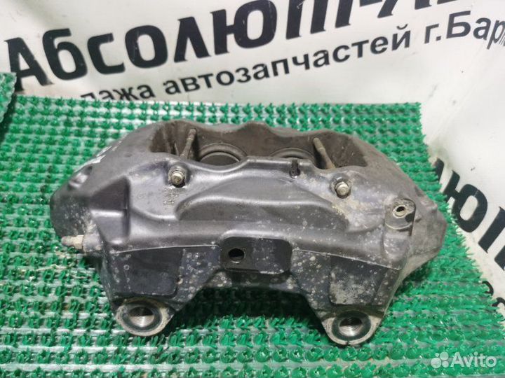 Суппорт тормозной передний левый Volkswagen