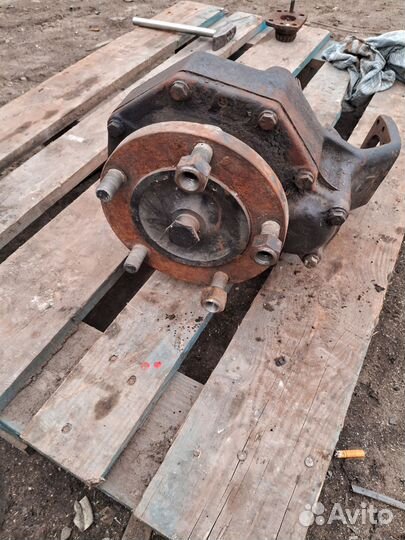 Бортовой редуктор переднего моста мтз 320 в сборе