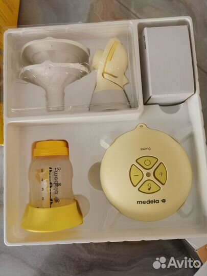 Молокоотсос medela электрический