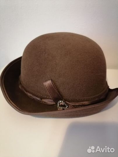 Женские меховые шапки