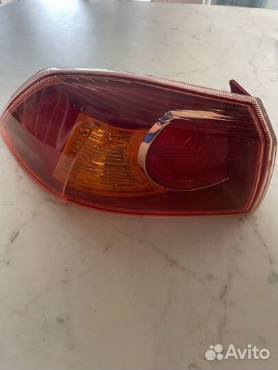 Задний левый фонарь Lancer X. Контрактный оригинал