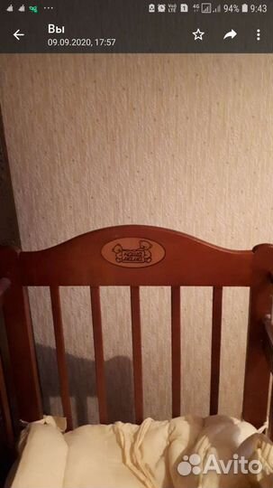 Детская кроватка с маятником и ящиками для белья