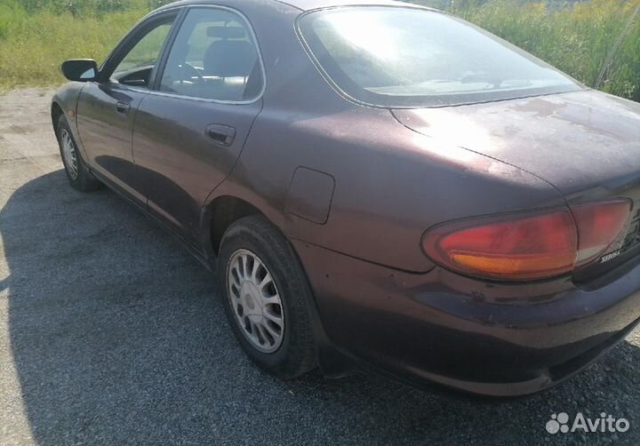 Мазда Кседос 6 по запчастям