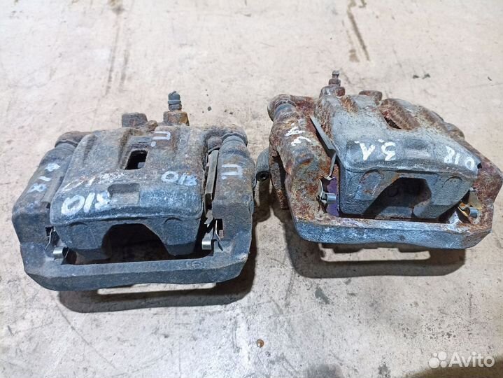 Суппорт тормозной задний Mazda CX-7 I рестайлинг