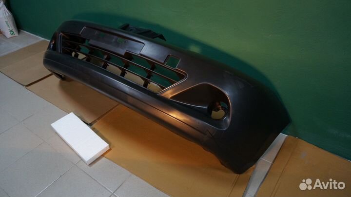 Бампер передний Nissan tiida 07-14