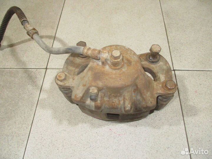 Суппорт передний правый Kia Sportage 2 (KM)