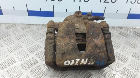 Суппорт тормозной передний левый opel corsa D (NNI