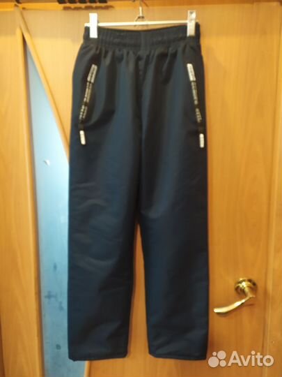 Брюки тёплые новые на мальчика р. 140